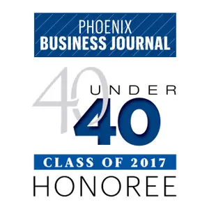 Phoenix Business Journal 40 Under 40 Class of 2017 Honoree badge — recognition award graphic in blue, grey, and white
