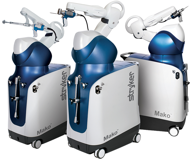 Three Stryker Mako robotic surgical systems displayed together from multiple angles, showing the robotic arm, surgical handpiece, and mobile cart in white and navy blue