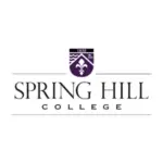 Spring Hill College logo — institutional crest with fleur-de-lis shield above stacked wordmark in purple and black on white background