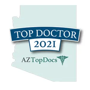 AZTopDocs Top Doctor 2021 badge — physician recognition award displayed over an Arizona state outline graphic in blue and mint green